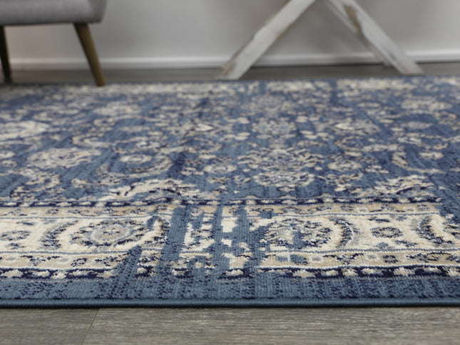 Arya Ziegler Distressed Navy Rug