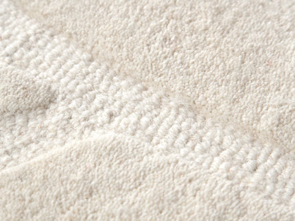 Les Nomades Ellipse Cream Wool Rug
