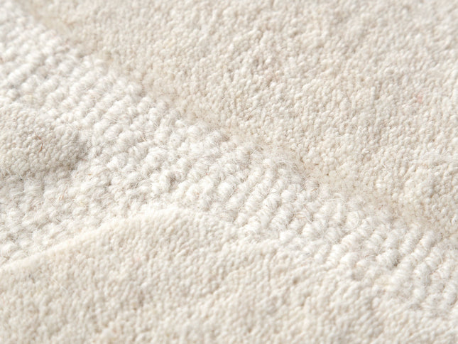 Les Nomades Ellipse Cream Wool Rug