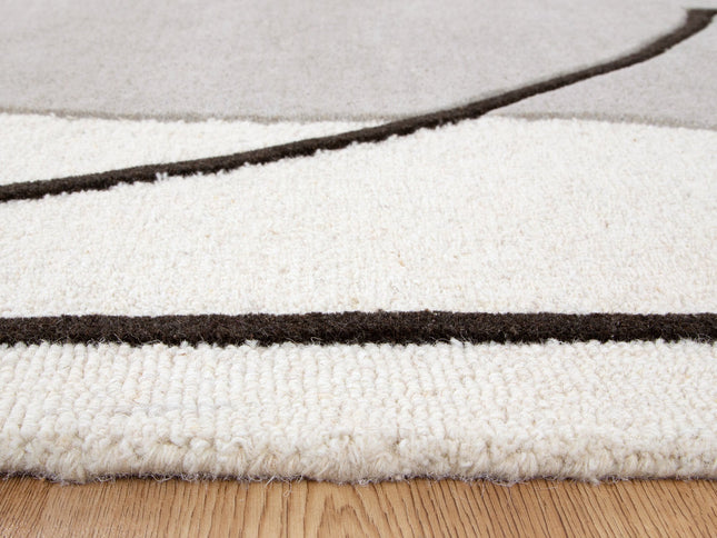 Les Nomades Minimal Beige Wool Rug