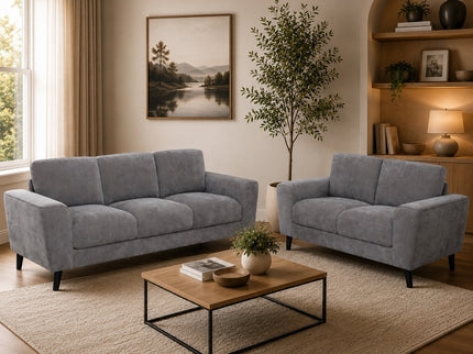 Dark grey Bondi 3+2 fabric sofa set with slim black legs, including a 3-seater and 2-seater lounge suite.

